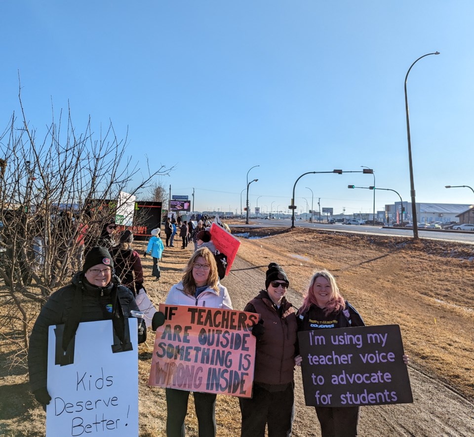teachers-on-strike-along-thatcher-drive-in-moose-jaw-on-feb-1-were-grateful-for-the-unseasonally-warm-and-sunny-weather-as-they-marched-for-the-third-time