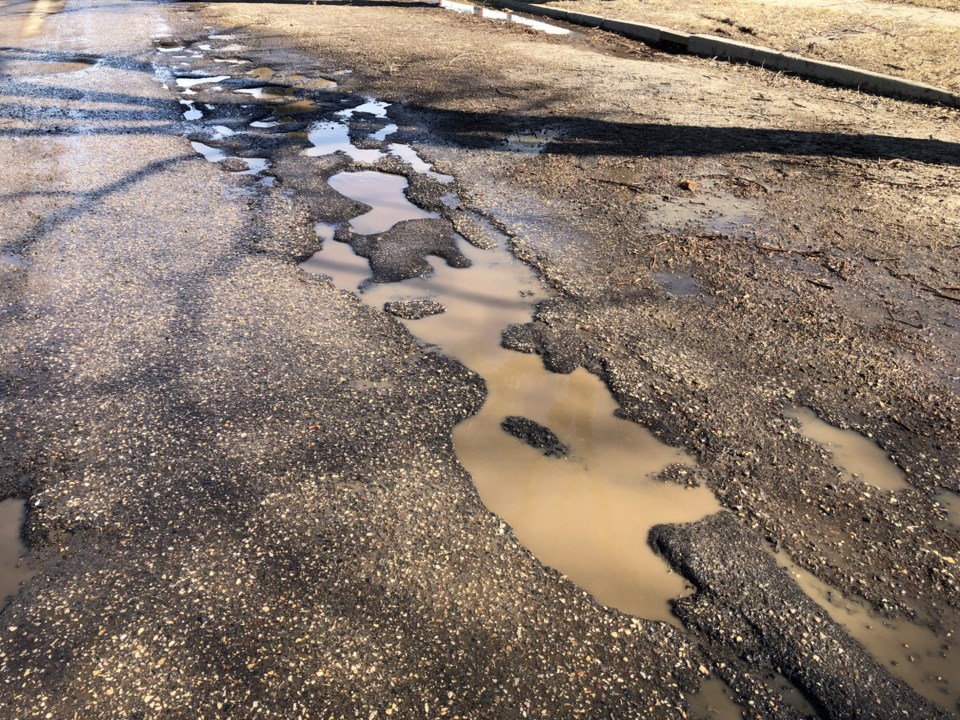 coteau-st-w-potholes-3