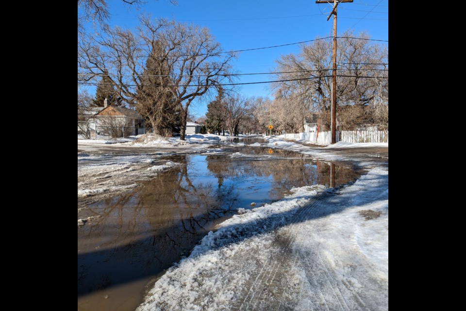 Iroquois Street W in South Hill is submerged for a significant part of its length