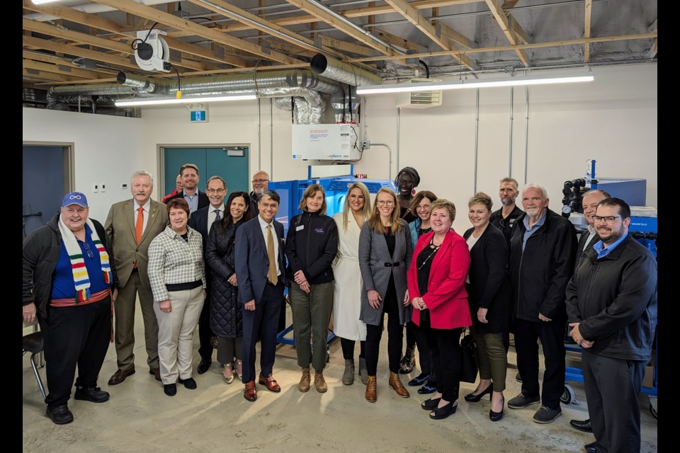 Sask Polytechnic leadership and staff, students, and industry and community partners take a group photo in the new lab