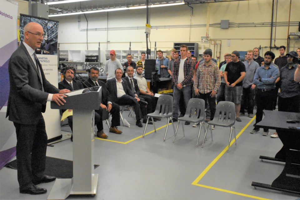 Grant Wilde, president/CEO of Spartan Controls, speaks at Saskatchewan Polytechnic on Sept. 17 about a donation of $1 million his company made to two programs at the school. Photo by Jason G. Antonio