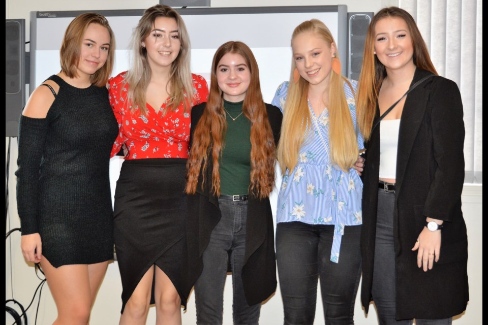 Brooke Buchko, Dessa Mohr, Kassidy Johnson, Alysa Beattie and Kelsey Foster from Reclaimed Love Co. pose after their presentation. Not pictured: Harlieanne Wiks. Matthew Gourlie photograph