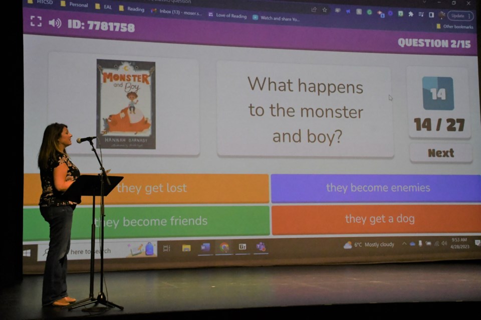 Stacey Moser with Holy Trinity Catholic School Division waits for students to answer a question about a book they've read during the 2023 Battle of the Books competition. Photo by Jason G. Antonio