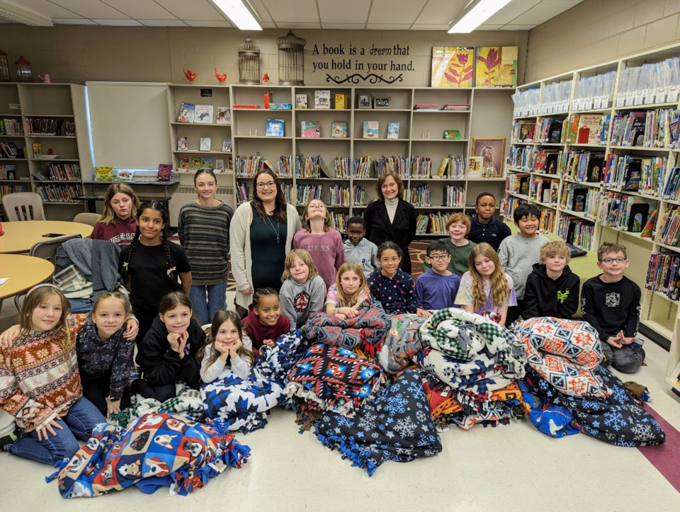 christine-bruces-grade-4-5-class-at-sacred-heart-school-with-the-blankets-they-made-for-the-homeless-also-pictured-are-tamra-reeve-and-della-ferguson