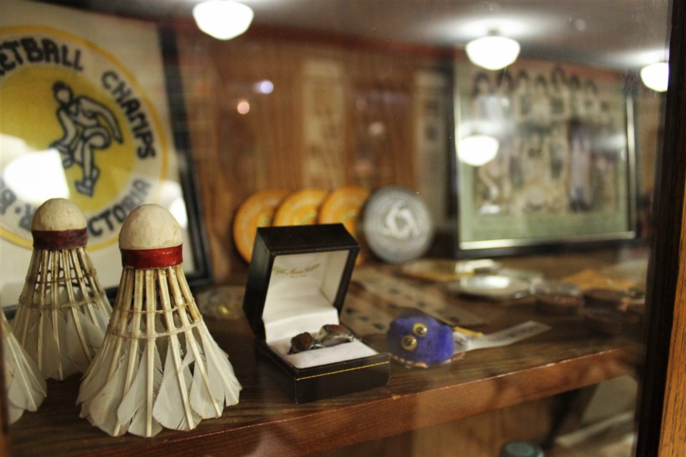 The display cases are home to memorabilia from various sports teams over the years.