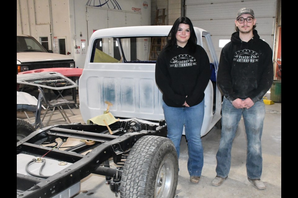 Amara Davidson and Nolan Novak, autobody students at A.E. Peacock Collegiate, recently competed in a provincial skills competition and won medals. Photo by Jason G. Antonio