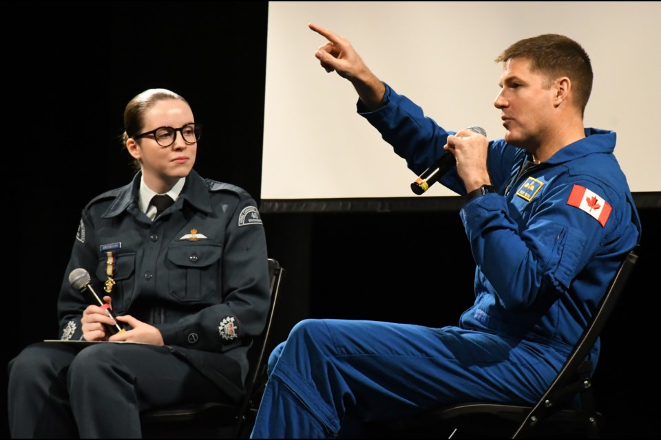 To infinity and beyond! Georgia Greenough, a warrant officer in No. 40 Snowbird Air Cadet Squadron, listens as astronaut Jeremy Hansen speaks about his mission into space in 2025. Greenough asked questions that students had submitted beforehand. Photo by Jason G. Antonio