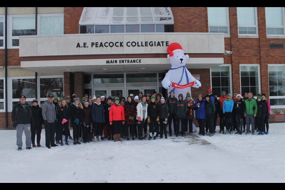 The group of runners assembled for the 2019 Polar Bear Run at A.E. Peacock Collegiate.