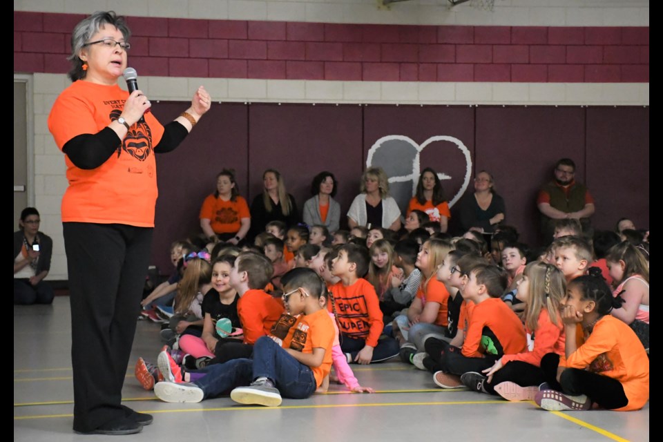 Phyllis Webstad speaks to students at Sacred Heart School on March 4 about her time spent at a residential school in Williams Lake, British Columbia from 1972-73. Photo by Jason G. Antonio