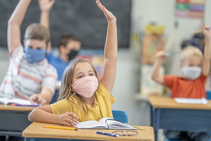 students in classroom with facemasks