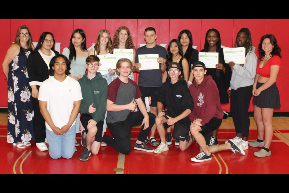 Vanier students with Prairie Sky clothing business receive the company of the year award during a year-end assembly. Photo courtesy Christa Lapointe 