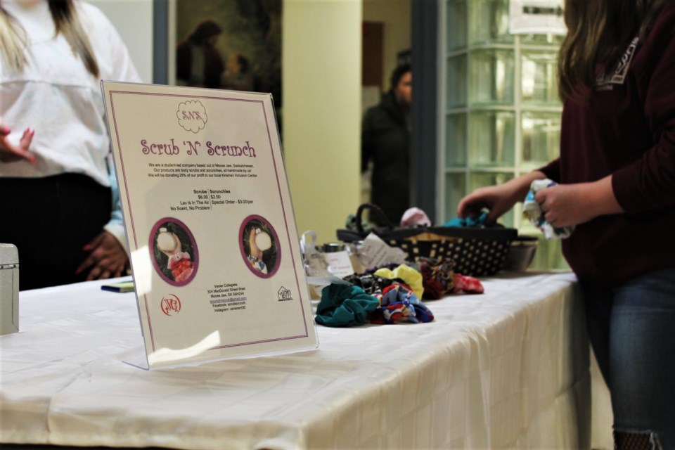 One student takes a look through the handmade scrunchies offered by one of Vanier’s Entrepreneurship businesses this year.