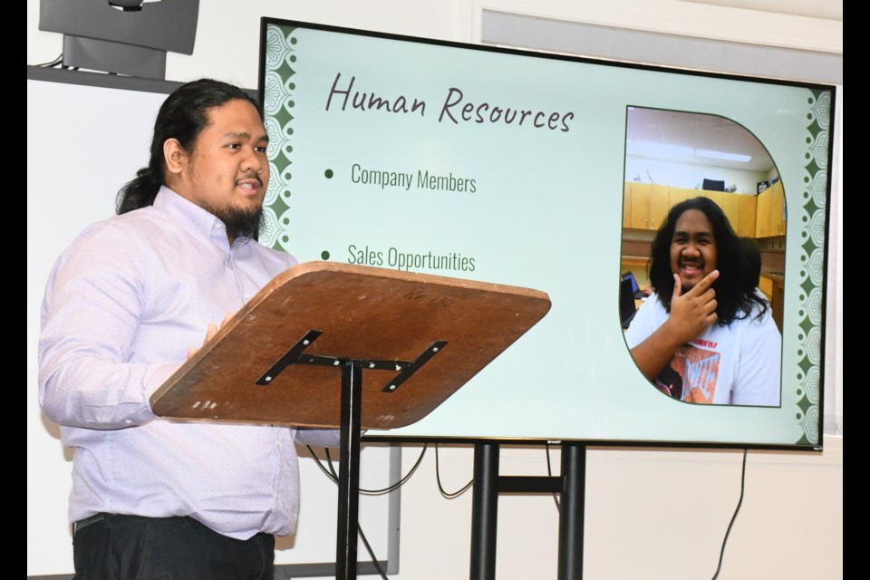 Lance Santos, head of human resources of soup company Mix Inc., gives his report during the business presentation. Photo by Jason G. Antonio 
