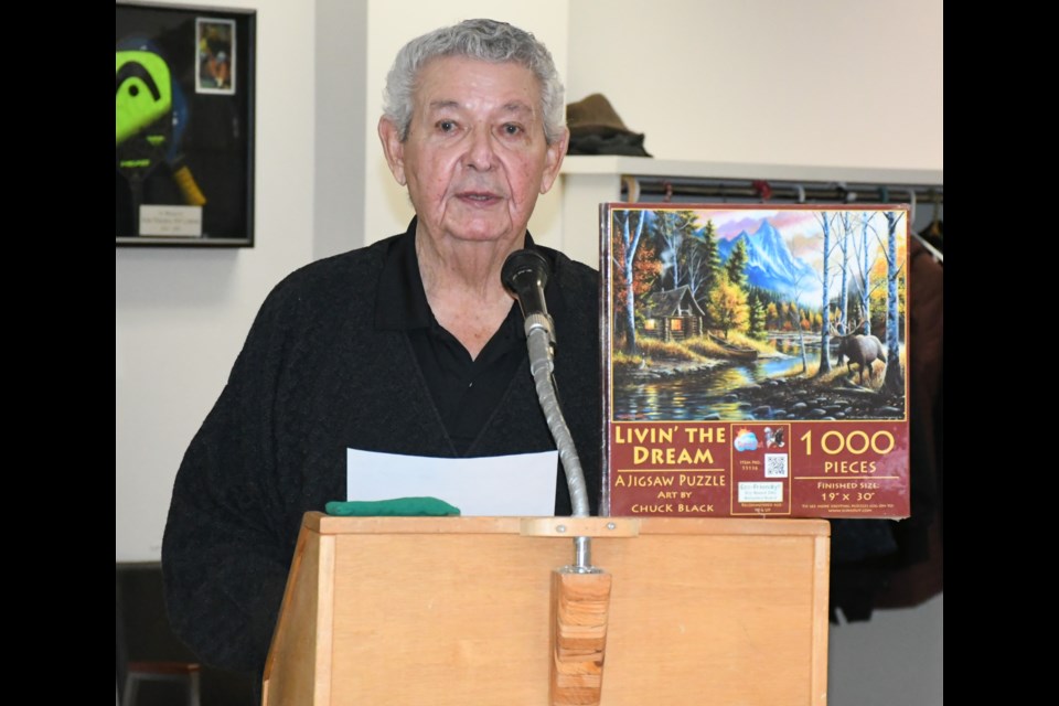 Earl Bernard with the Moose Jaw and District Senior Citizens’ Association speaks about the 1,000-piece puzzle fundraiser during the project launch on Feb. 15. Photo by Jason G. Antonio 
