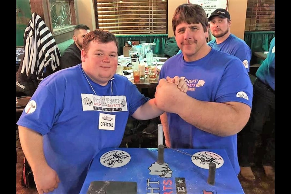 Brandon Olafson, left, from Moose Jaw and Jeff Dabe from Minnesota each took part in a super match in the Fit II Fight Armsports League’s The Duke Invitational at Bugsy’s. (submitted photograph)