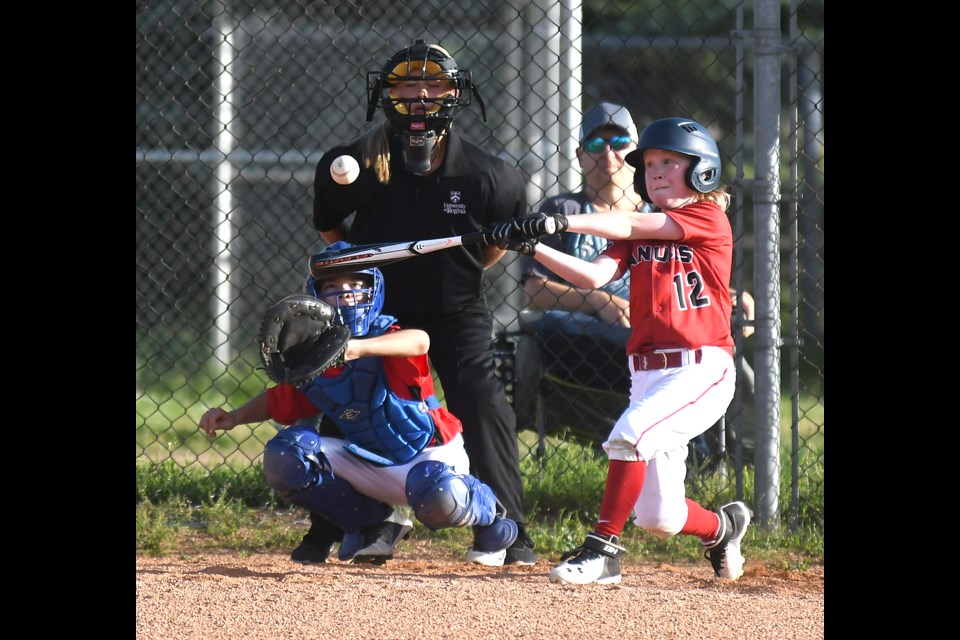 Sam Gaucher puts a ball into play during fourth-inning play.