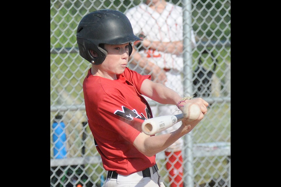 Dylan Anderson raps a base hit to kick off the Canuck’s four-run fifth inning comeback in game two against the Buffalos.