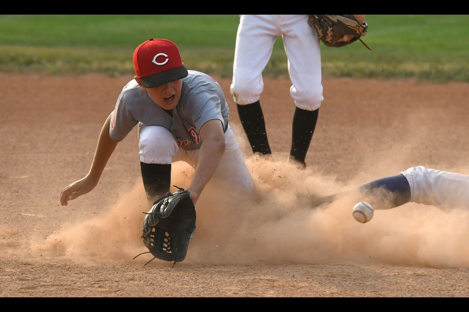 Shortstop Max Craig picks up the throw on this steal attempt.