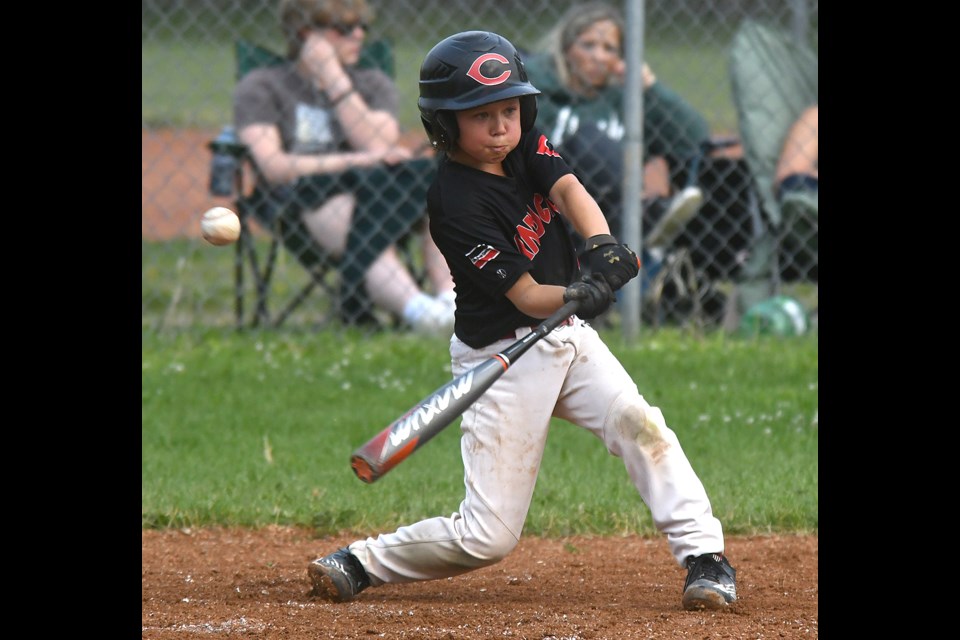 Canucks Red hitter Isaiah Ross managed to get just enough of this pitch to foul it off.