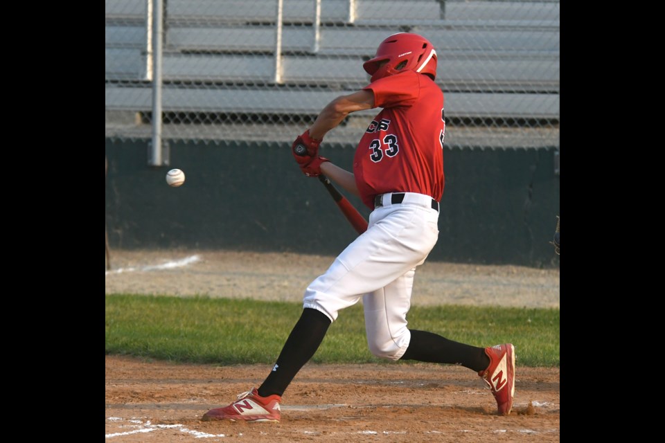 Cole Breitkreuz hits a two-run single in the fourth inning for the Canucks.