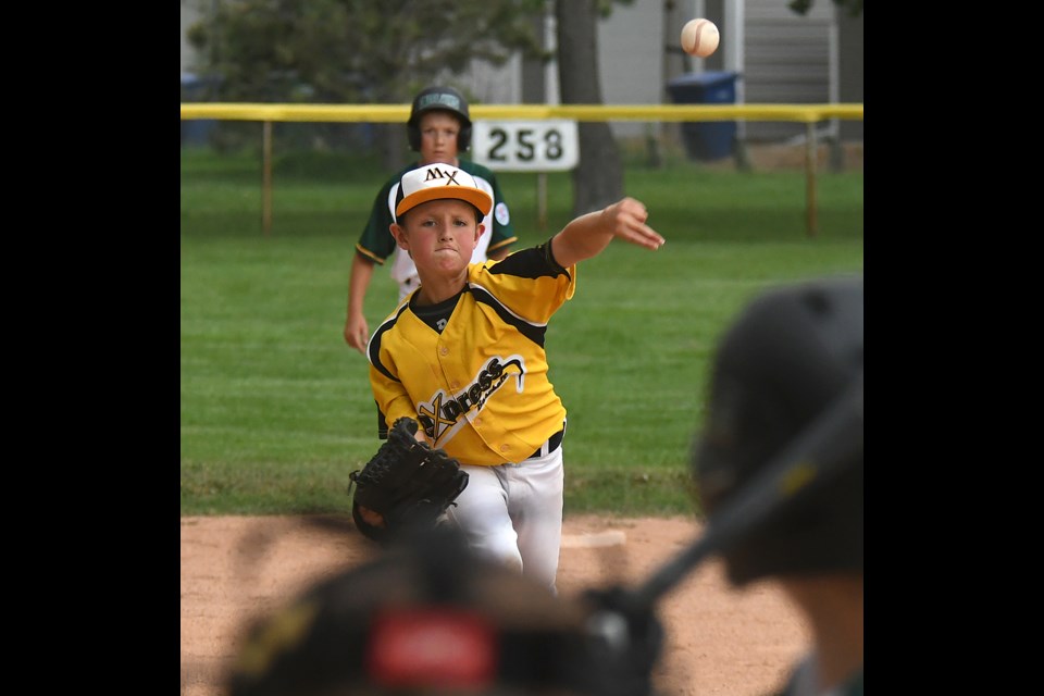 Rylan Gray delivers for the Moose Jaw Major AAA Miller Express early in Thursday’s contest.