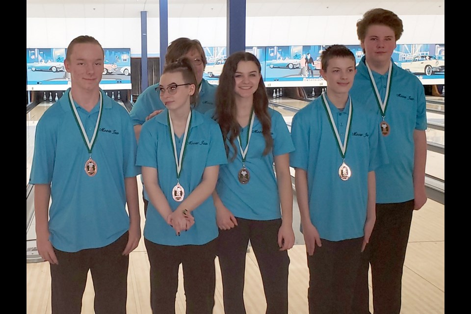 The Moose Jaw mixed team won bronze at the Youth Challenge provincials, including Connor Johnson, Tristan Smith, individual silver medalist Cassia Montgomery, Trevor Coxe, Kelsey Gehlen and coach Crystal Johnson (back).