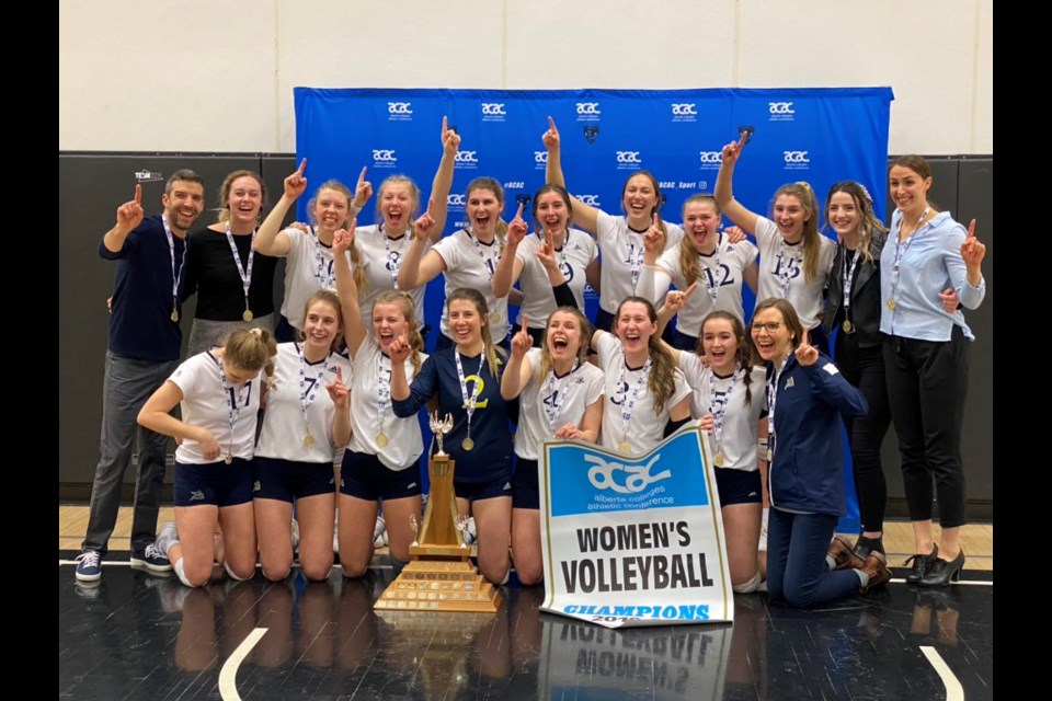 The Briercrest Clippers women’s volleyball team celebrate their Alberta Colleges Athletic Conference championship. ACAC.ca photo