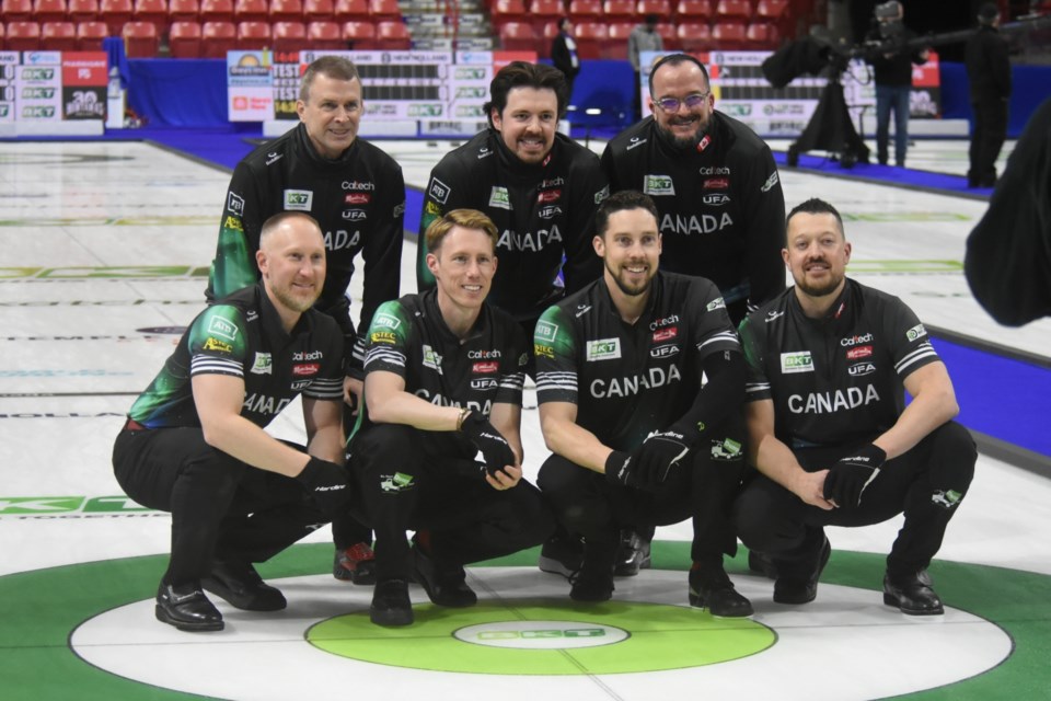 The Brad Jacobs rink -- better known as Team Canada -- gather for a team photo after their practice session on Friday afternoon. 