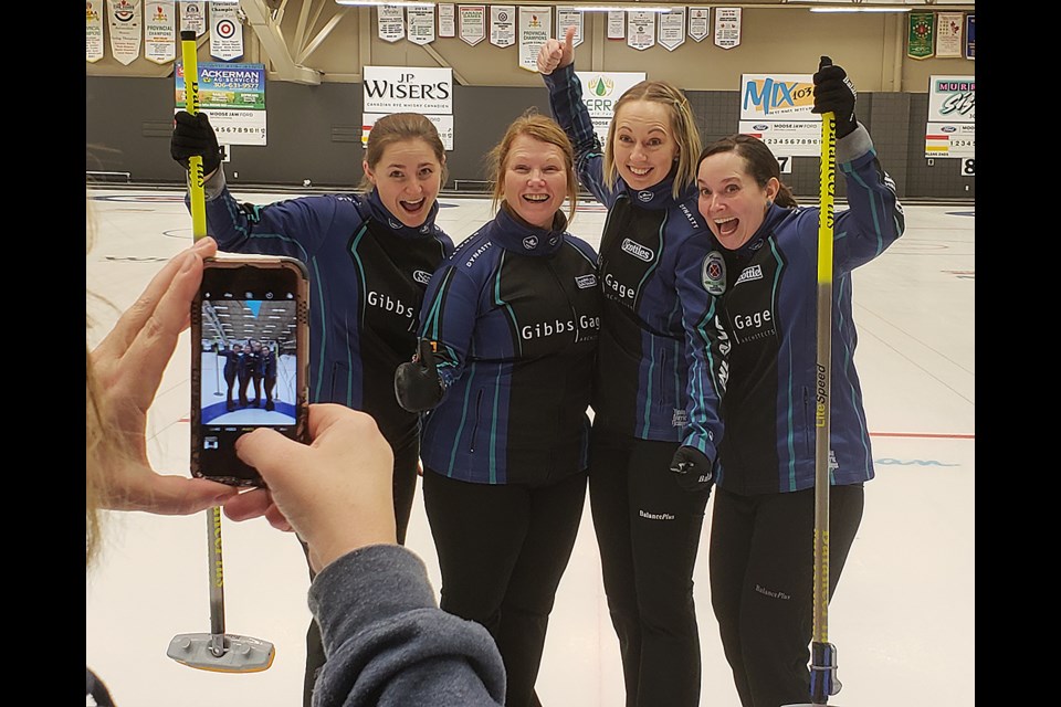 Penny Barker, Deanna Doig, Christie Gamble and Danielle Sicinski ham it up for the camera after winning the Moose Jaw SWCT stop.