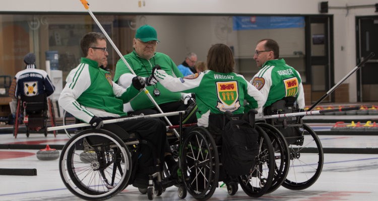 Marie Wright and her Team Saskatchewan teammates celebrate their 2018 national championship. Curling Canada photo