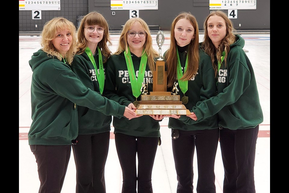 The Peacock Toilers took first place in high school girls curling city championship. 