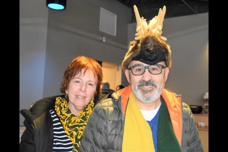 Curling fans Mary and Tom Miharija travelled from Thunder Bay, Ont., to watch Team Northern Ontario compete at the Scotties. Tom wore a toque with floppy moose antlers during the event, which attracted some questions from curious onlookers. Photo by Jason G. Antonio