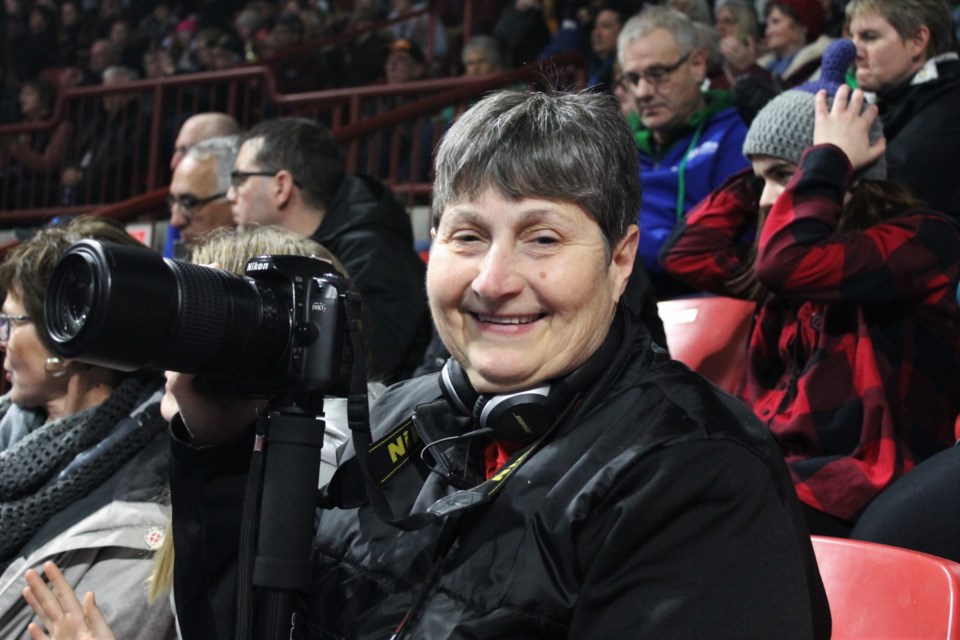France Isabelle, a photographer for New Brunswick Curling Association, has attended 32 of  33 Scotties Tournament of Hearts. She has developed many fond memories in that time and has become a well-known fan to many curlers past and present. Photo by Larissa Kurz
