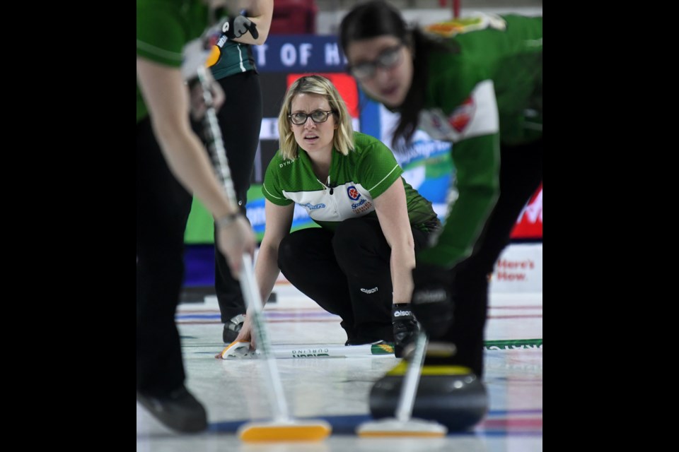 Saskatchewan's Stefanie Lawton watches the line on a shot.