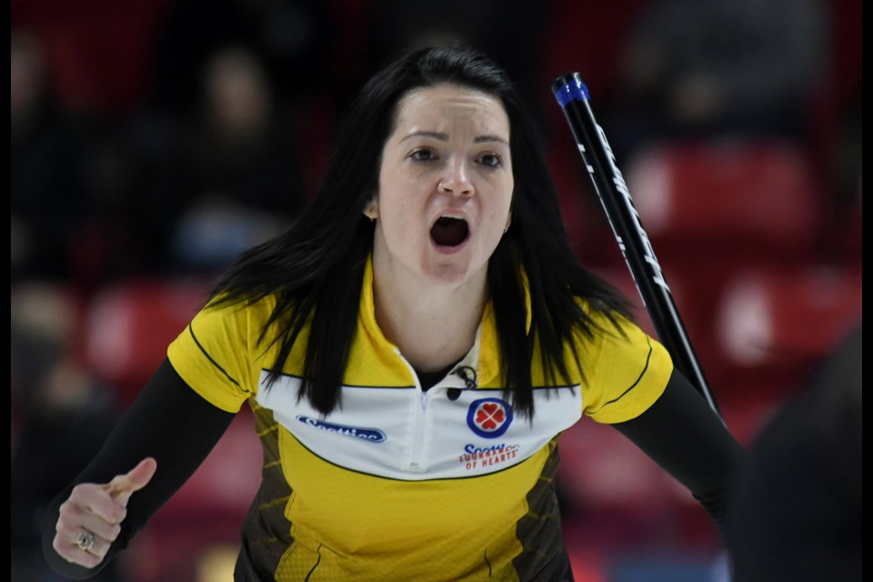 Manitoba's Kerri Einarson calls line.