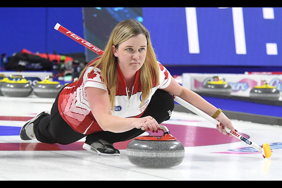 Team Canada’s Chelsea Carey delivers a shot during practice on Friday afternoon.