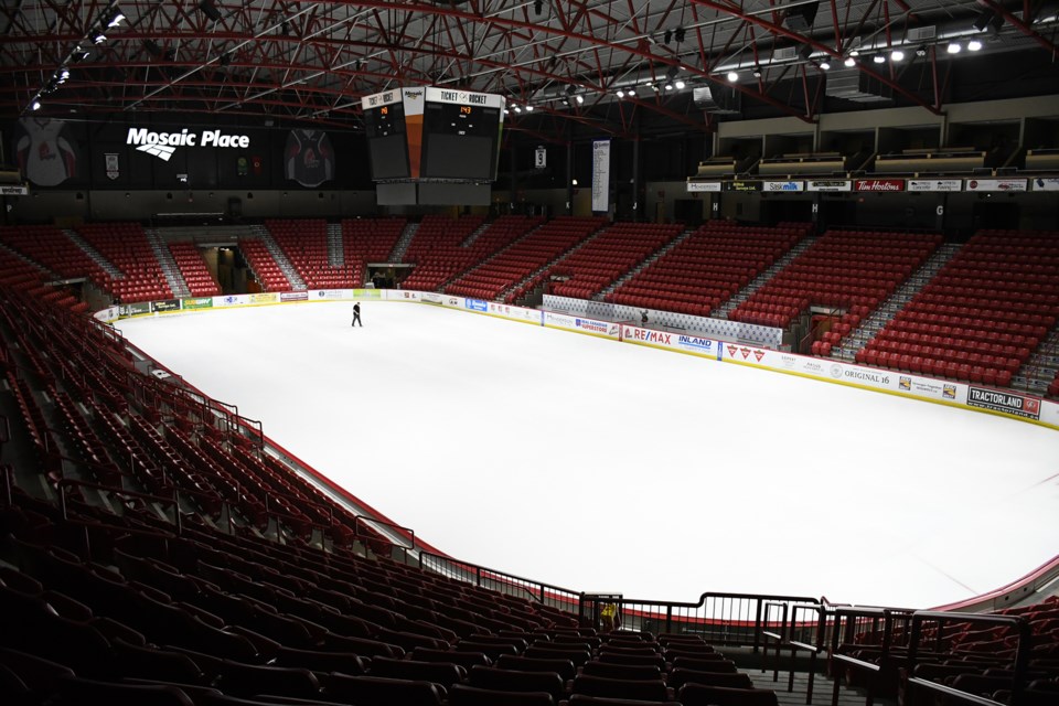 By early afternoon on Sunday, the glass had been taken down, nets raised, some seats removed and the first coat of white paint and ice sealant had been placed.
