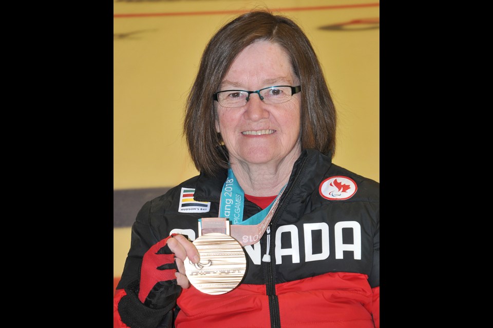 Moose Jaw's Marie Wright shows off her bronze medal won at the 2018 Paralympic Games.