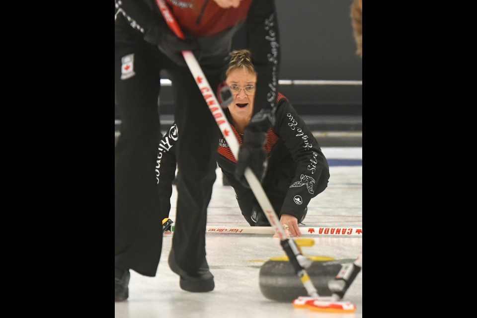 Sherry Anderson yells to her sweepers during the Moose Jaw Sask Women’s Curling Tour stop.