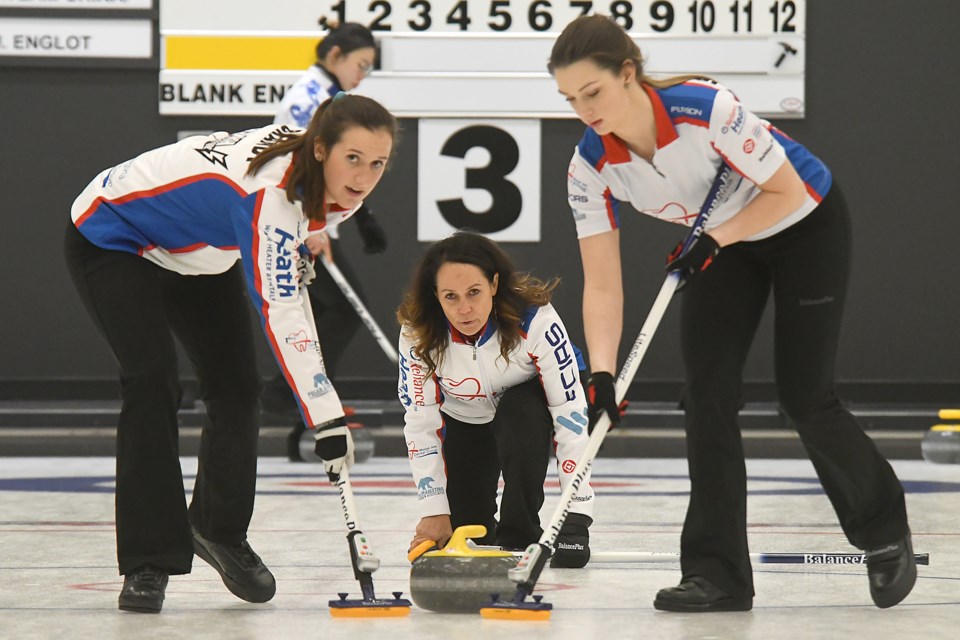 Michelle Englot delivers her first stone in the sixth end against Team China during the Saturday afternoon draw.