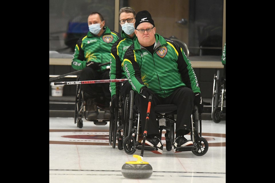 Moose Gibson watches the line on a shot during a practice session at the Moose Jaw Ford Curling Centre earlier this month.