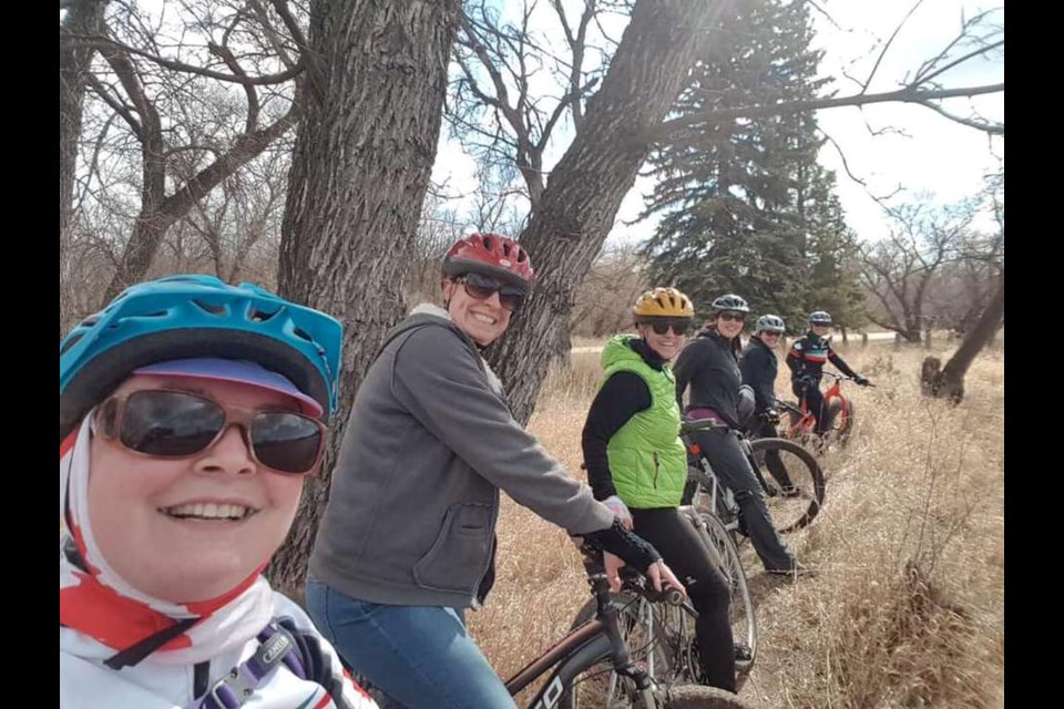 Riders in the Moose Jaw Pavers Prairie Pedals all-women riding group pause for a photo on the Wakamow Valley trails. Facebook photo