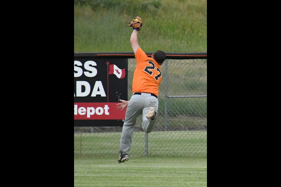 Giants right fielder Tyler Kieferling makes a running catch to rob the Canadians of at least a double, if not more.