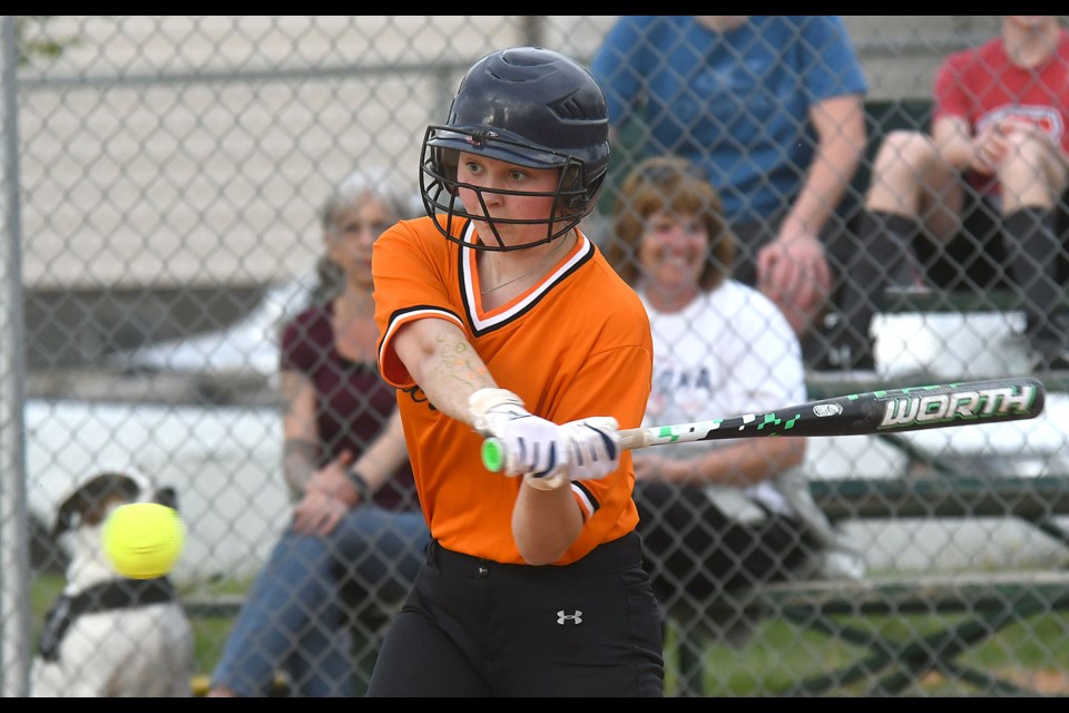 Action from the Moose Jaw and District Minor Girls Fastball game between the Firecrackers and Shadow.