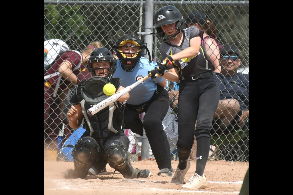 U15 AA Ice hitter Sophia Johnstone got just enough of this pitch to foul it off.