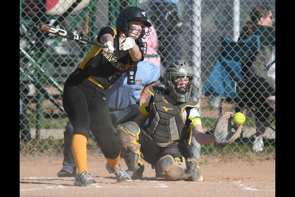 Action from Regina Minor Softball League U15 A contest between the Moose Jaw Ice and Regina Lazers on Wednesday evening.