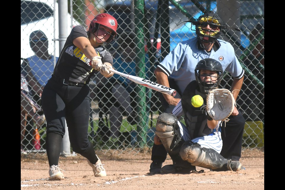 Macy Litzenberger would get just enough of this Cubs offering to record an infield base hit.