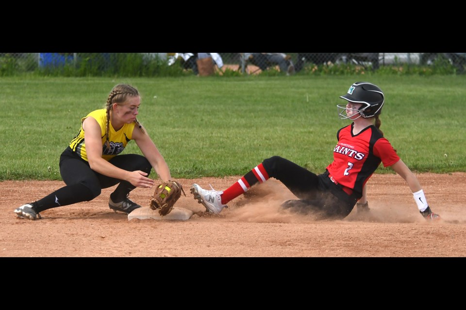 Ice shortstop Jasmine Kohl looks to put the tag on a Saints baserunner.