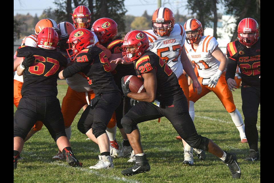 Central’s Javin Boynton finds room behind his offensive line and would go off for a 53-yard touchdown against Yorkton.