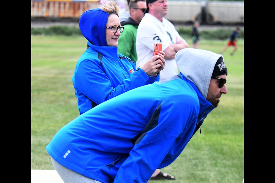 Moose Jaw Youth Flag Football president Wendy Vincent snaps a few photos during the final games in her decade-long tenure as president.